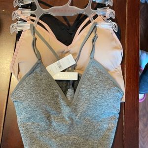 3 Danskin sport bras - never used - did not fit
